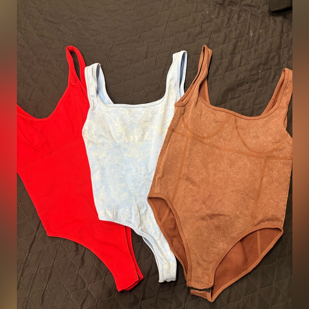Body suits- Red, Blue, and Brown